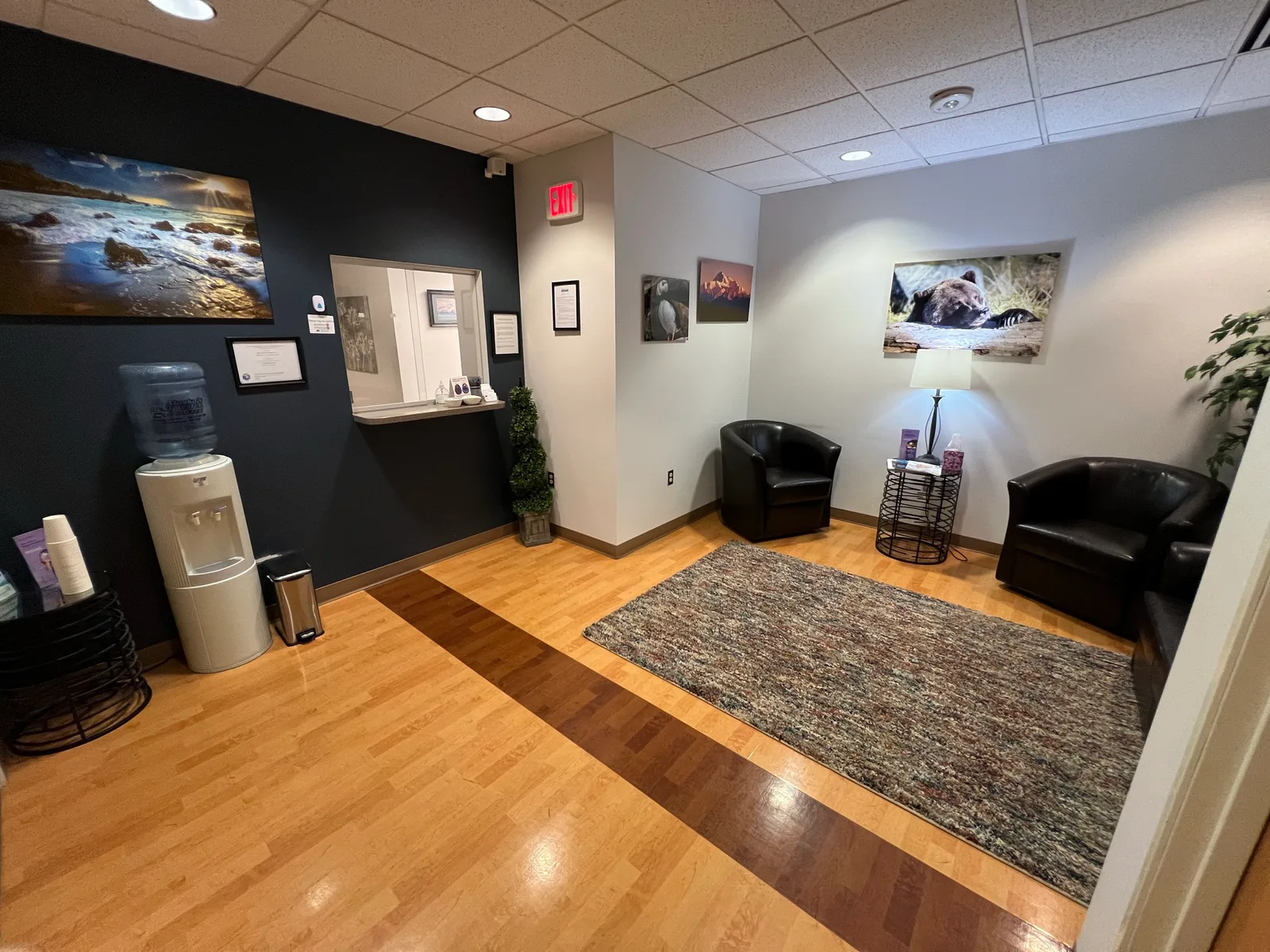 Empty Anchorage treatment-center waiting room with chairs and reception context.