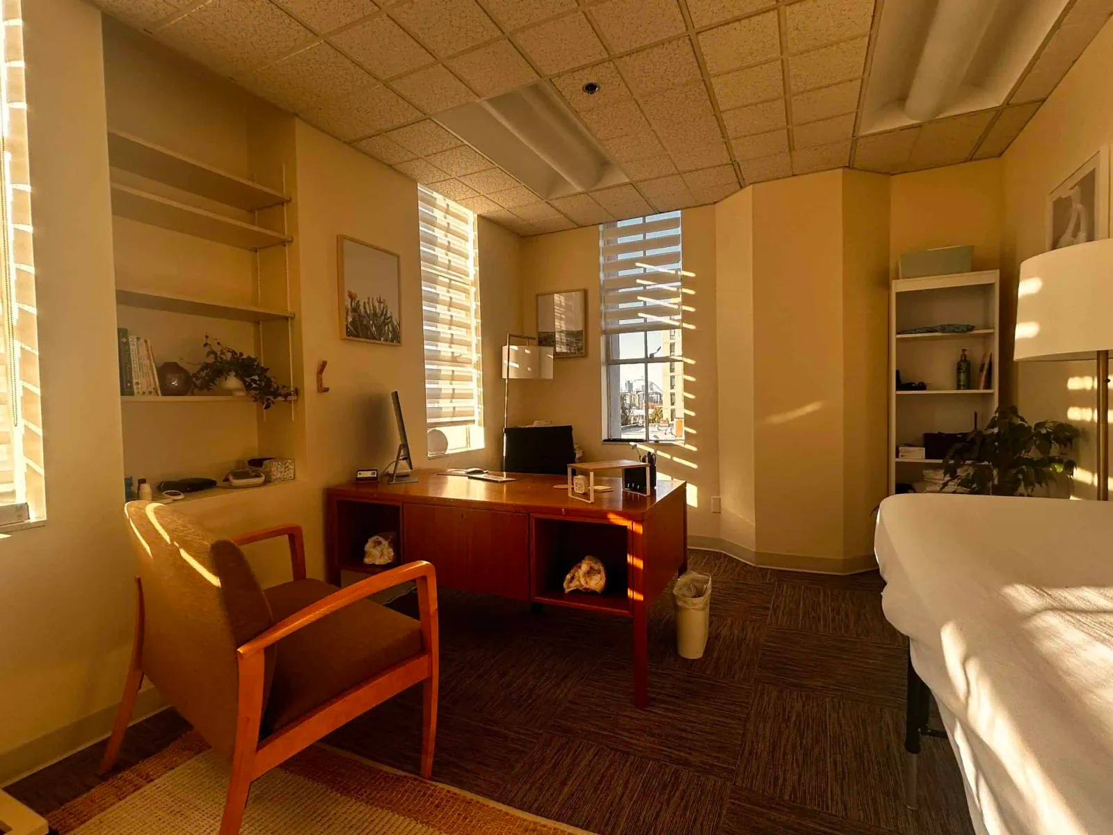 Empty Portland clinic room with treatment chairs and office furnishings.