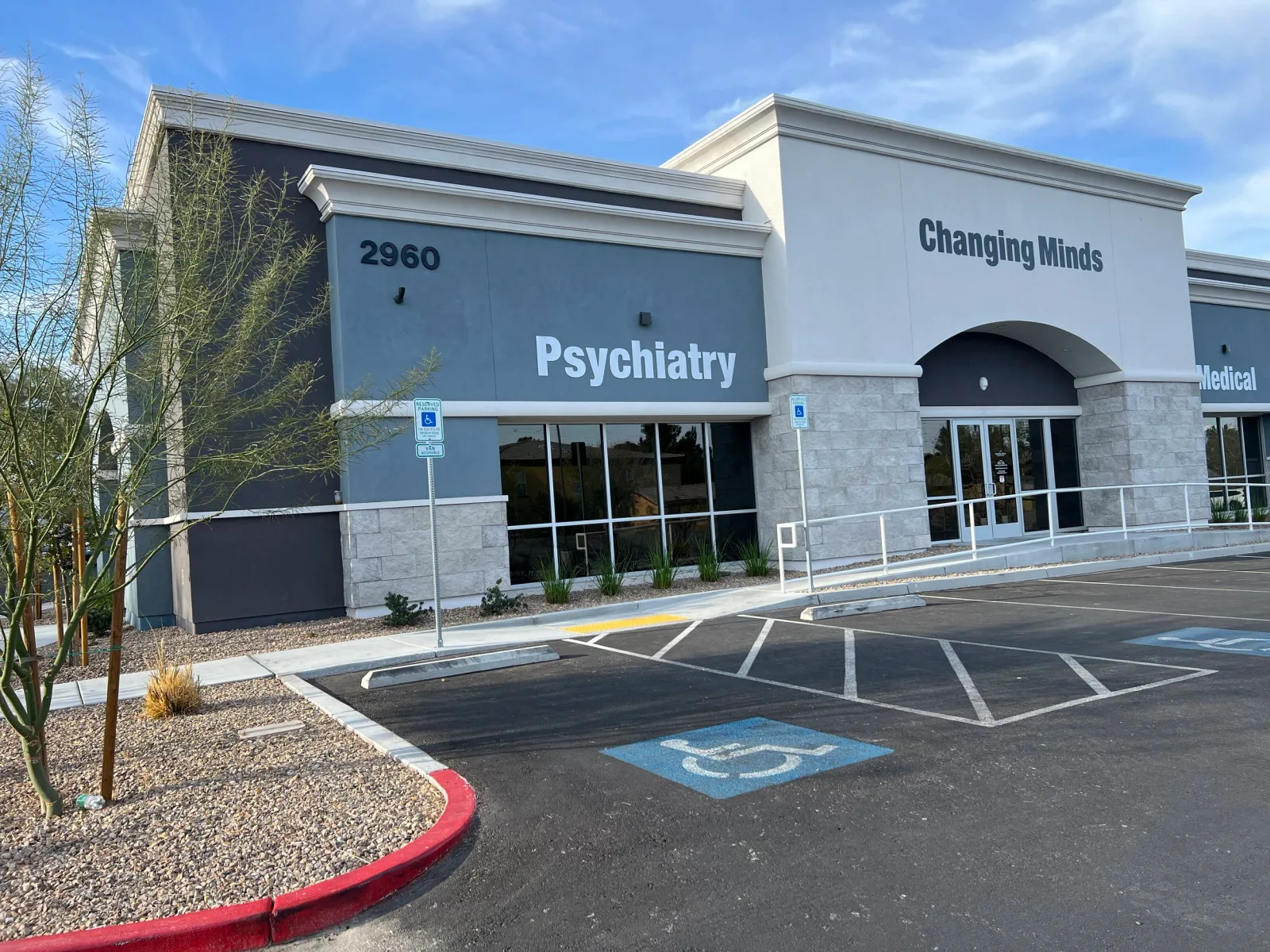 Henderson exterior with Changing Minds Psychiatry signage and 2960 address