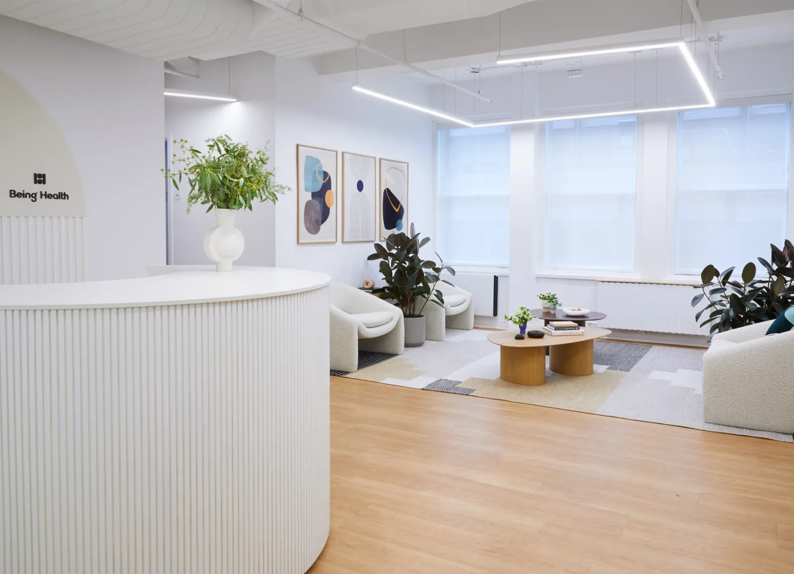 Empty reception/waiting area with clinic seating and architectural details