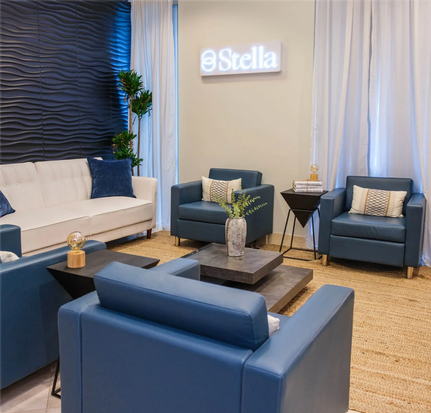Signed Stella Irvine waiting area with modern seating.
