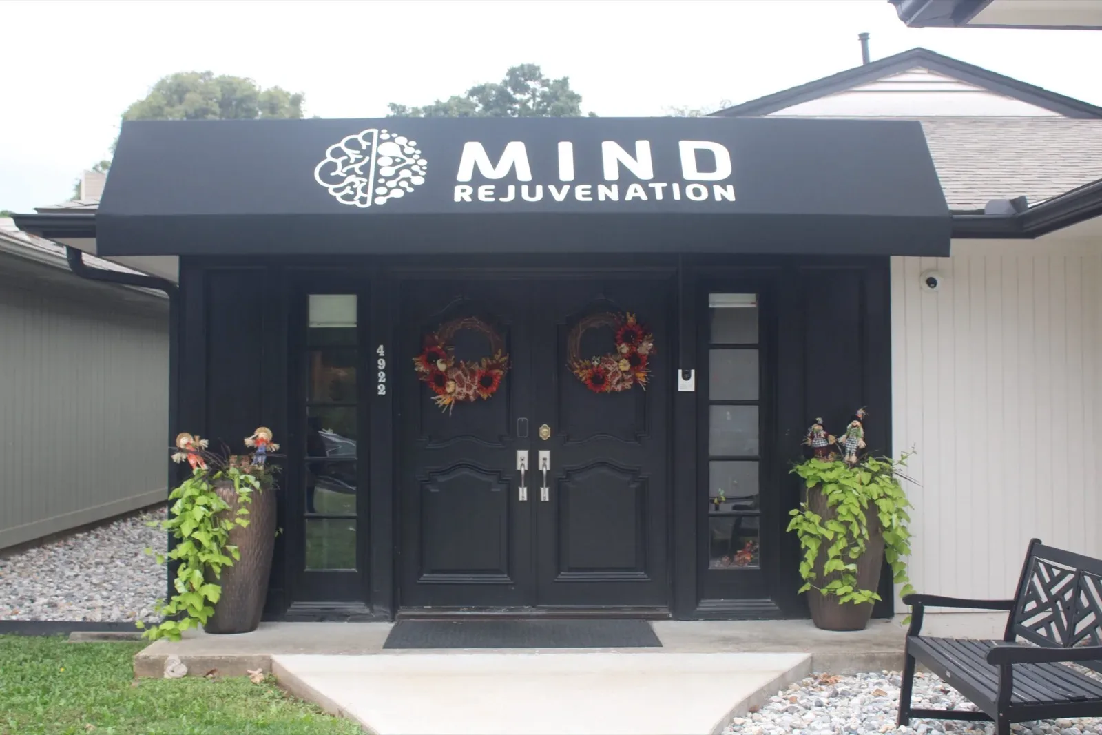 Signed Mind Rejuvenation clinic entrance and storefront.