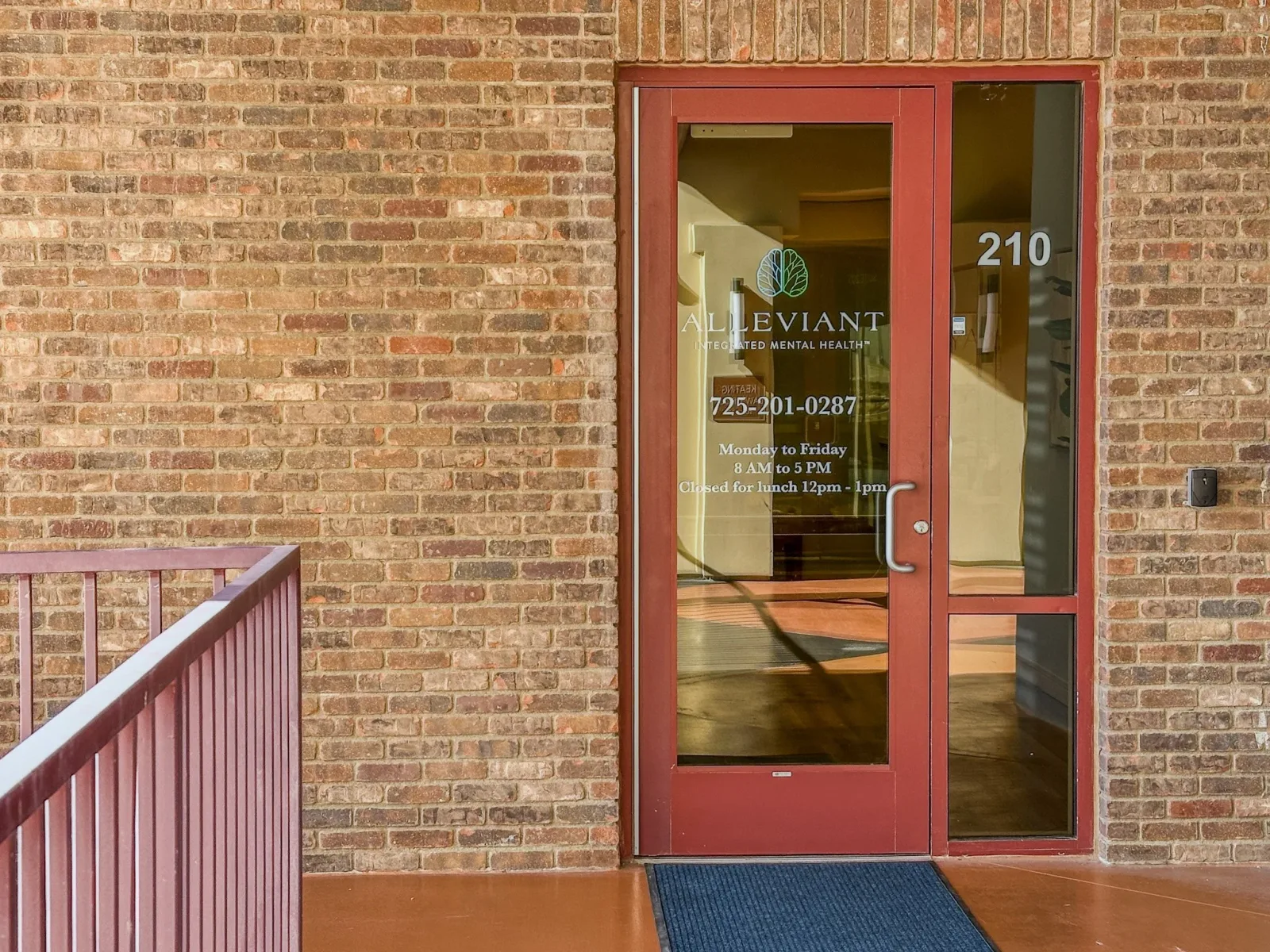 Signed clinic entrance, Suite 210