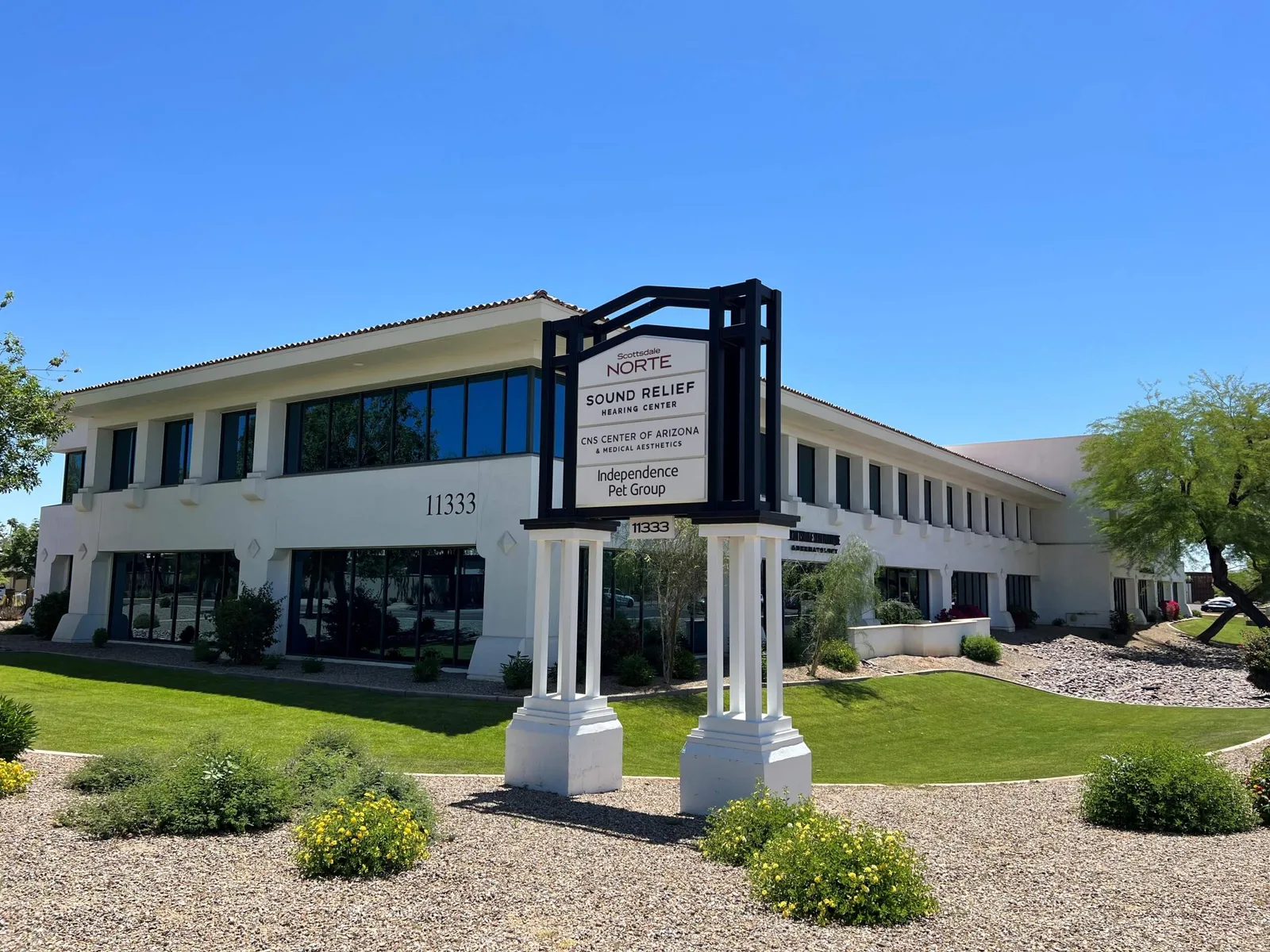 Exterior of the CNS Center of Arizona building, with number 11333 visible.
