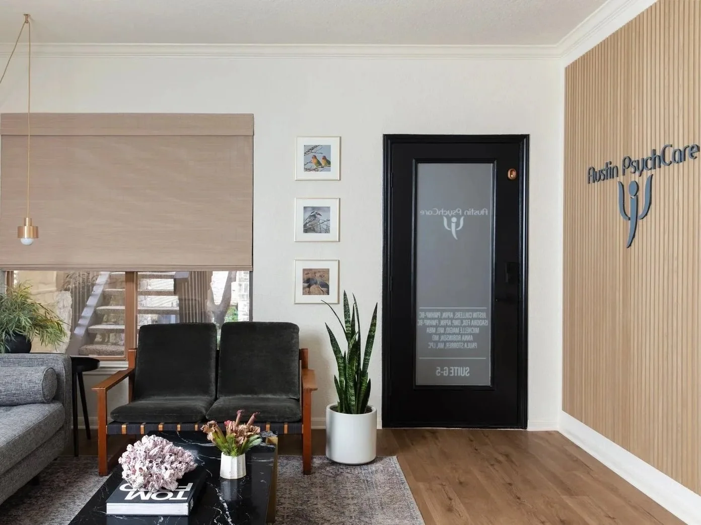 Reception area with Austin Ketamine Care name on the wall
