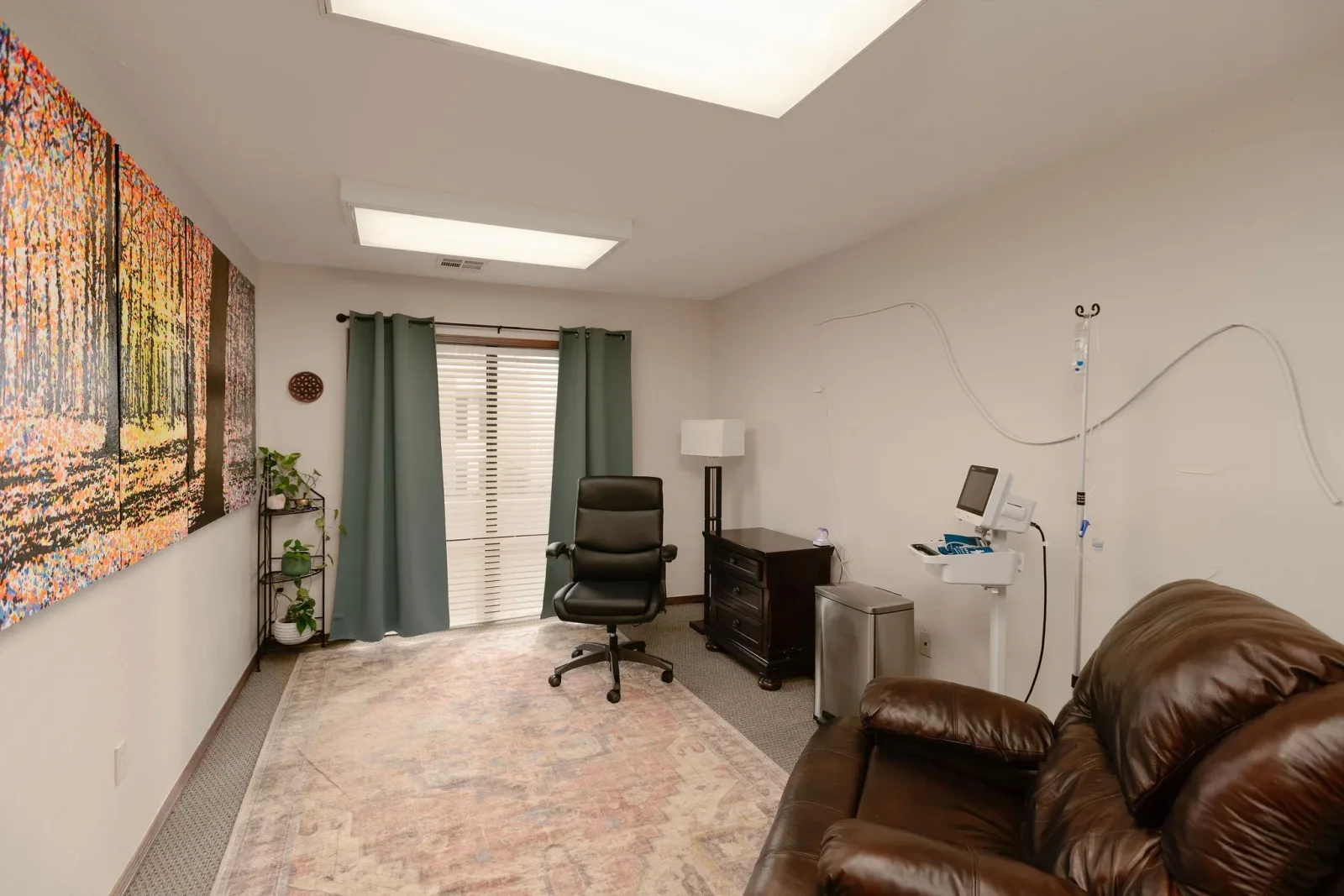 Empty Integrative Psychiatry Oklahoma infusion/treatment room.